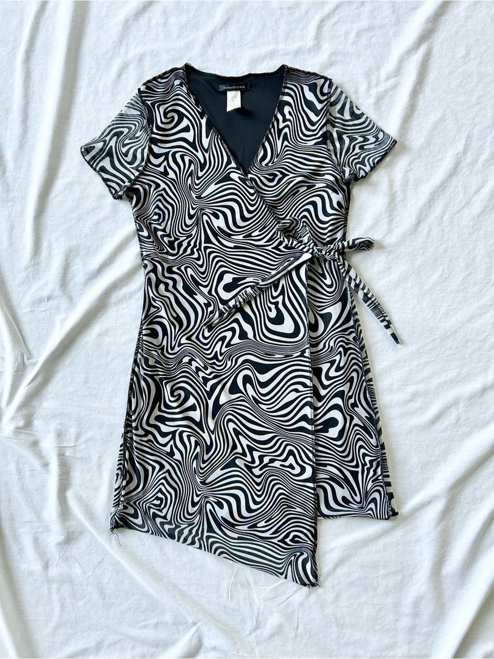 Caution to the Wind Swirl Print Mesh Mini Wrap Dress w/ Inverse Seams